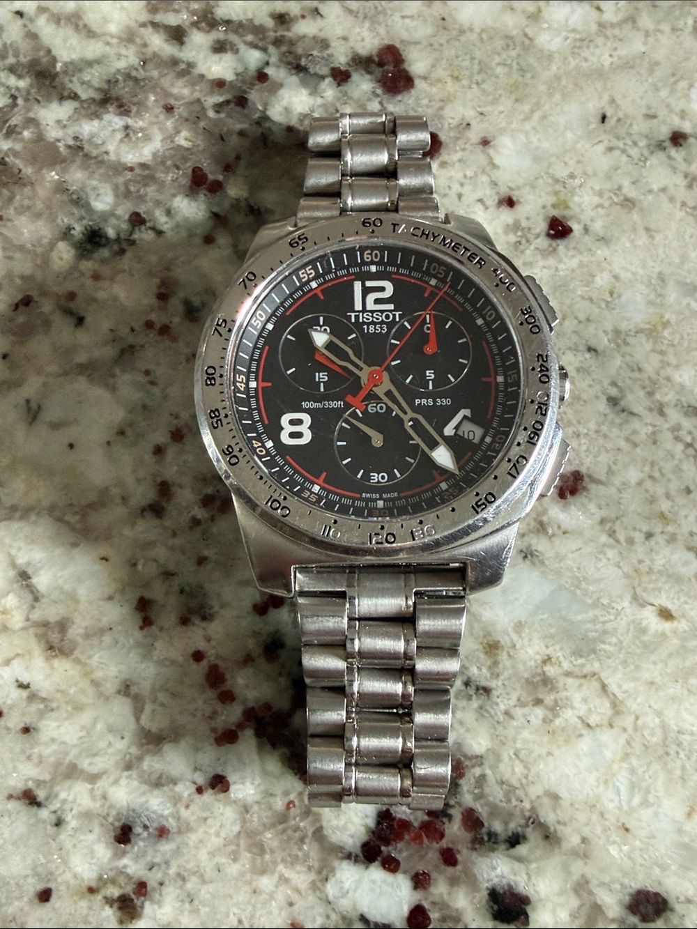Tissot Black Dial Chronograph Watch with Red Accents